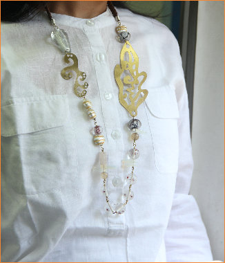 Brass motif and white beads